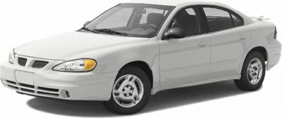 Silver sedan with front side view, distinct headlights and steel wheels