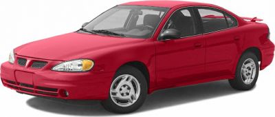 Red sedan with distinctive front grille and rear spoiler