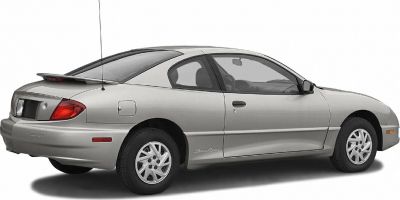 Rear side view of silver coupe with spoiler and two-door design