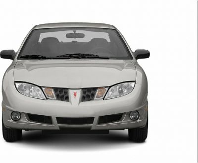 Front view showing headlights, grille, and fog lights of a coupe.