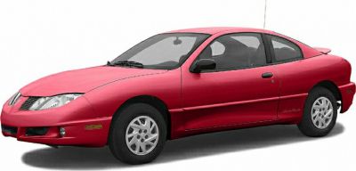 Front right side view of a red coupe with smooth lines and two doors.