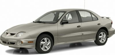 Four-door sedan with distinctive front fascia and alloy wheels.