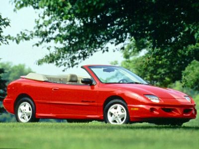 Red convertible with sporty two-door design and beige interior
