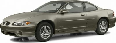 Two-door coupe with unique front design and alloy wheels.