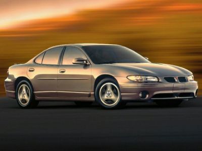 Sleek four-door sedan with smooth lines and alloy wheels