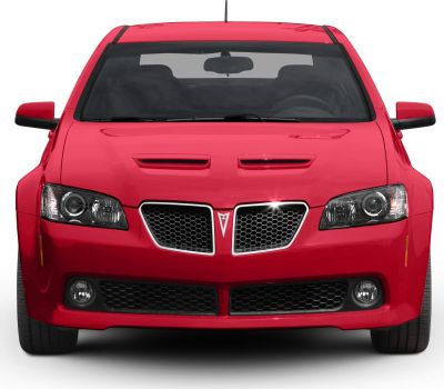 Front view with hood vents, dual grille, and headlights.