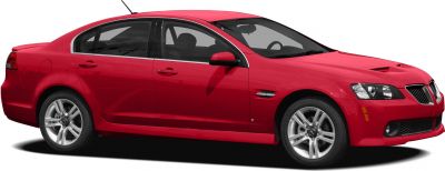 Red four-door sedan with sporty alloy wheels and bold front grille