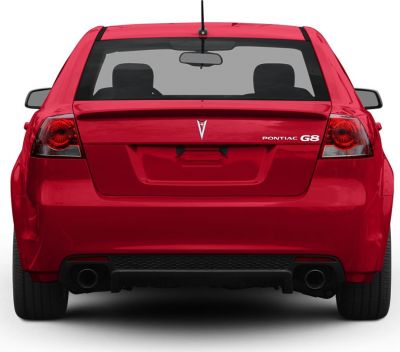 Rear view with distinctive taillights, Pontiac emblem, and dual exhaust tips