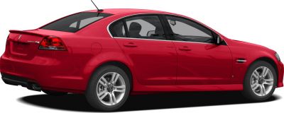 Red sedan rear and side view with spoiler and alloy wheels