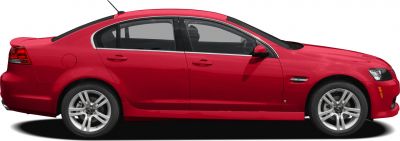 Side profile of a sedan with alloy wheels and rear spoiler