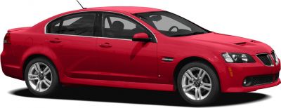 Sporty four-door sedan with alloy wheels and aggressive front grille