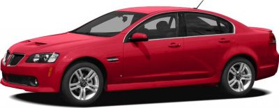Red four-door sedan side profile with alloy wheels