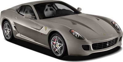 Front side view showing sleek headlights and alloy wheels.