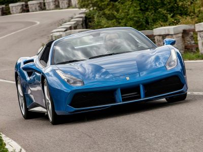 Front view with sharp headlights and aerodynamic grille