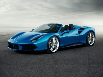 Blue convertible with aerodynamic curves and sharp LED headlights