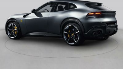 Rear-side view with taillights and sporty alloy wheels