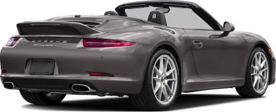 Open roof sports coupe rear with dual exhaust and alloy wheels