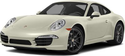 Front side view with distinctive headlights and alloy wheels