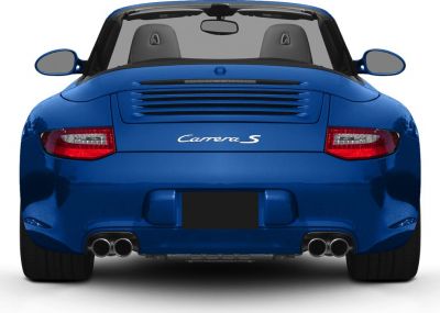 Rear view of a convertible sports car with quad exhaust and rear air vents