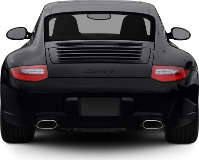 Rear view with tail lights, dual exhausts, and wide rear stance