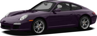 Sleek coupe with round headlights and aerodynamic body.