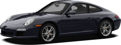 Front side view of a sleek sports coupe with alloy wheels and aerodynamic shape