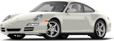 Front-side angle view of a white coupe with alloy wheels and aerodynamic body.