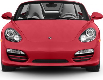 Front view with distinctive headlights and sleek open-top interior