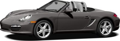 Side profile of a sleek convertible roadster with alloy wheels