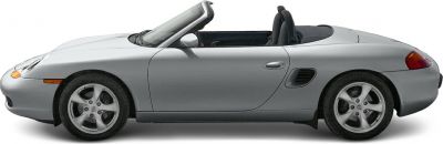 Side view of a silver convertible with sporty design and open-top.
