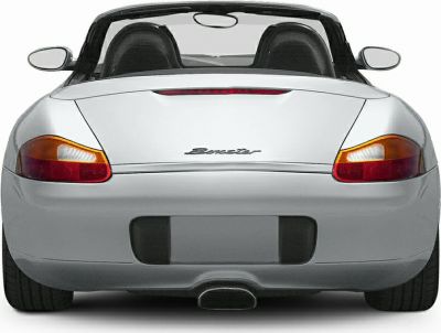 Rear view with distinct taillights and central exhaust of a sporty roadster