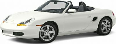 White two-seater convertible with rounded headlights and alloy wheels