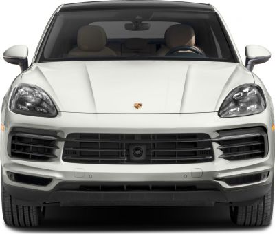 Front view with prominent headlights and grille