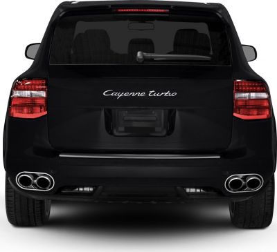 Rear view of SUV with quad exhaust and taillights
