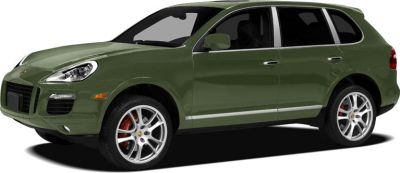 Side profile of green SUV with alloy wheels and four doors
