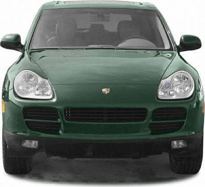 Green SUV front with headlights, grille, and emblem