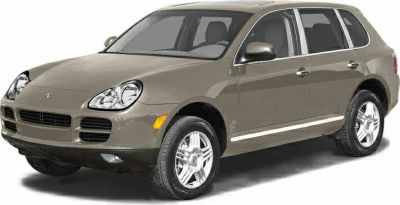 Front-side view of a beige SUV with distinct headlight and grille design