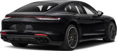 Luxury sedan rear view with quad exhaust and sleek taillights