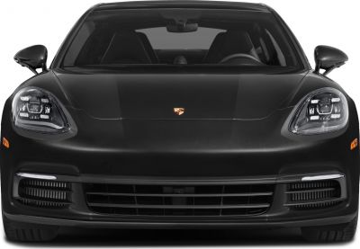 Front view with distinctive LED headlights and aerodynamic hood