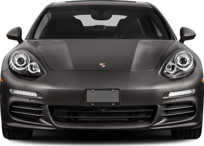 Front view with round headlights and sleek hood.