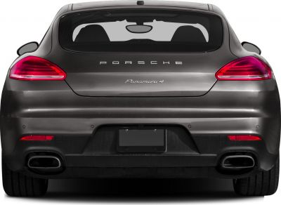 Rear view showing tail lights and dual exhaust of a luxury sedan