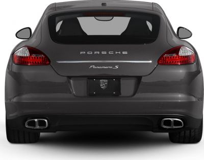 Rear view featuring taillights and dual exhaust outlets
