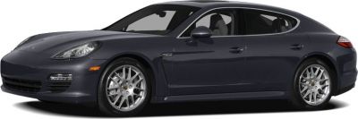 Side profile of sporty sedan with alloy wheels and aerodynamic body