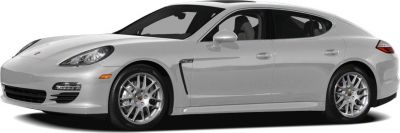 Silver 4-door luxury sedan with distinctive headlights and alloy wheels.