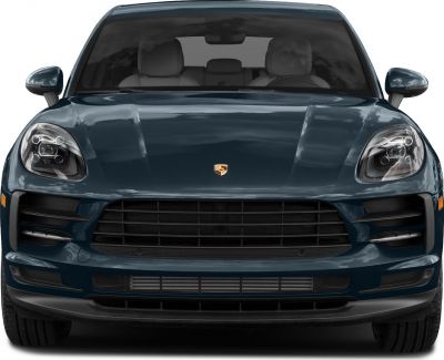 Front view showing LED headlights and large black grille