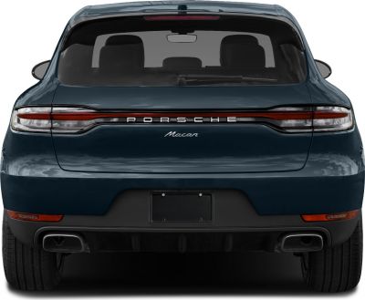 Rear view showing full-width LED taillight and dual exhaust setup.