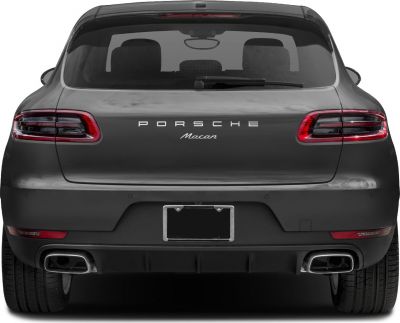 Rear view showing dual exhausts and sleek taillights