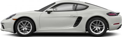 Side profile of a sleek white sports coupe with distinctive alloy wheels