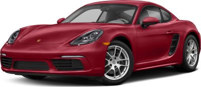 Red sports coupe with sleek headlights and alloy wheels