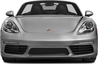 Front view of a convertible sports car with distinctive headlights and aerodynamics.